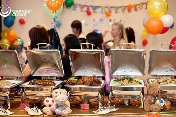 Delicious buffet catering spread with kebabs, roasted vegetables, and fresh salads at Glenny Kebabs.