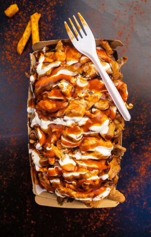 Delicious chicken wrap with fresh veggies and a tangy sauce at Glenny Kebabs