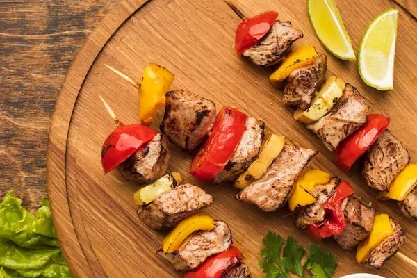 Delicious chicken kebabs with smoky flavors at Glenny Kebabs.