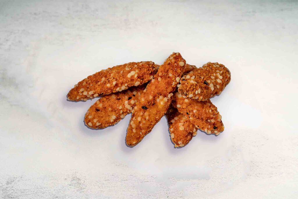 Image of 6 crispy, golden chicken tenders served together, showcasing the tender, juicy meat inside with a perfectly crunchy exterior.