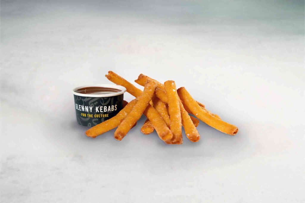 Golden, crispy donut fries served with fresh strawberry, Nutella, or Biscoff dip for a sweet and indulgent snack.