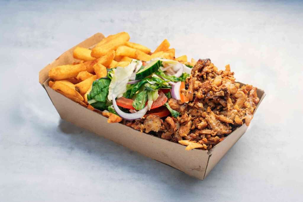 Gym Pack featuring tender lamb, juicy chicken, or a mix, served with a refreshing garden salad and seasoned chips or cumin-infused basmati rice.