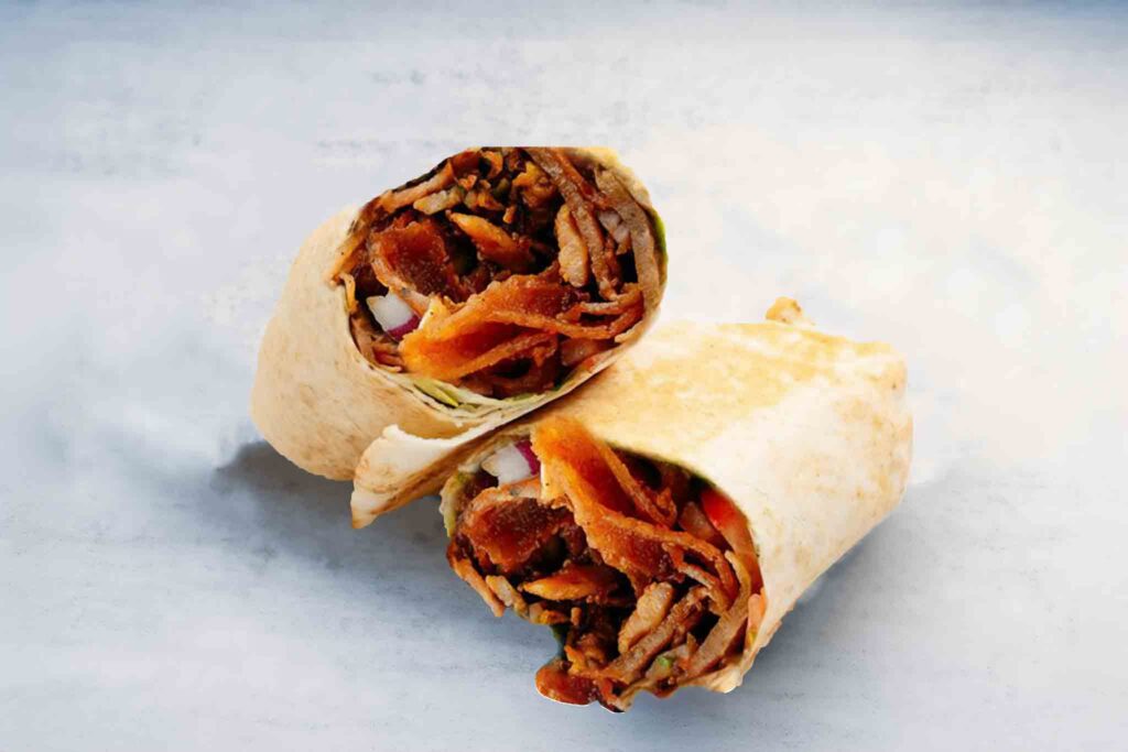 HSP Wrap featuring seasoned chips, mozzarella cheese, choice of meat, and sauce, all wrapped in soft pita bread for a delicious and portable meal.