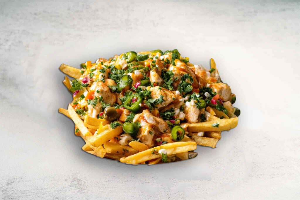 Loaded fries topped with spiced chicken, fresh tabouli, jalapeños, and creamy garlic sauce for a flavorful, satisfying bite.